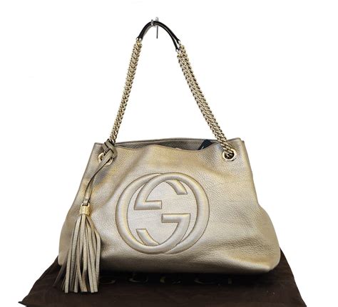 gucci gold chain purse strap|Gucci signature wallet on chain.